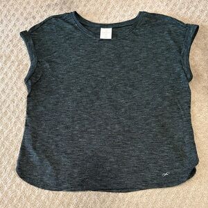 Workout top with capped sleeve.